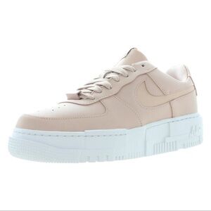 Nike Women’s Low-Top Sneaker in Pale Pink with White Sole